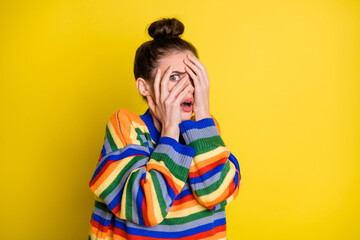 Poster - Photo of stressed scared brunette girl close face wear rainbow sweater isolated on bright yellow color background