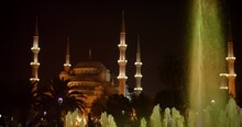 Colorful Fountain Underneath Hagia Sophia In Istanbul At Night, Wide