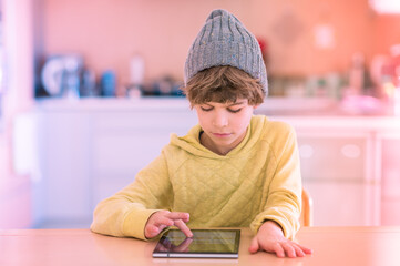 Little boy using digital tablet.