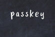 College chalk desk with the word passkey written on in
