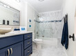 © AdrieDee - Navy, white and grey modern bathroom