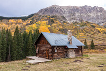 Gothic Cabin - Rustic Log Cabin With A Tin Roof On The Edge Of Town In Gothic Colorado In Gunnison County In Autumn