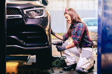 Sticker - Girl mechanic changing tires