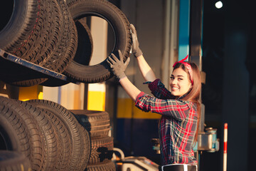 Sticker - Girl mechanic changing tires