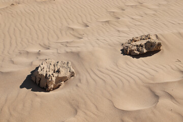 Poster - Rock formations in a dry desert.