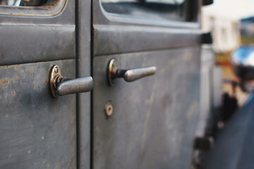 Sticker - Closeup shot of door handle in an old vintage car