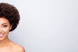 © deagreez - Close up half face copyspace photo of attractive afro american girl look after spa pure silky salon foundation concealer procedure isolated grey color background