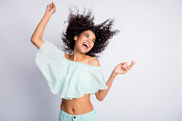 Poster - Photo portrait of dancing woman with flying hair isolated on white colored background