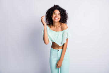 Photo portrait of black skinned girl laughing wearing mint stylish off-shoulders top isolated on grey color background