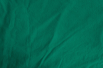 Green rippled cotton fabric texture background