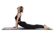 © New Africa - Young woman in sportswear practicing yoga on white background