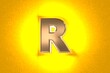 © Dancing Man - aged gold or copper metal alphabet with intense yellow noisy backlight - letter R isolated on orange, 3D illustration of symbols