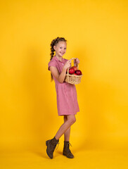 happy teen kid with apples full of vitamin picked from autumn harvest, vitamin