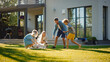© Gorodenkoff - Beautiful Smiling Family of Four Cuddling Happy Golden Retriever Dog on the Backyard Lawn. Idyllic Family Cuddling Loyal Pedigree Dog Outdoors in Summer House Backyard.