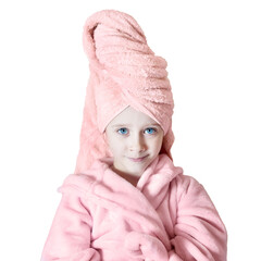 Wall Mural - a little girl with blue eyes in a pink robe and a pink towel on her head after a bath smiles and loo