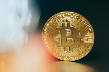 Wall Mural - Bitcoins and new virtual money. Gold coin with B.Mining icon or blockchain technology