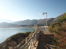Fenced Trail Along The Mediterranean Coast On A Sunny Day, Crete Island
