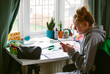 © Helen Rushbrook/Stocksy - Covid 19 Home study teenager