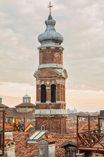 Roofs And Towers Of Churches In Venice At Sunset