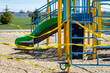 © Amanda Large/Stocksy - Covid-19 measures close off playground equipment