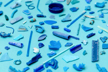 Pieces Of Blue Plastic On The Blue Background