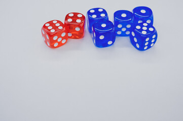 Canvas Print - Top view of red and blue dice isolated on white background