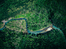 Aerial Shot Of A Winding River In The Green Arkansas Wilderness