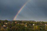 Fototapeta Tęcza - Rainbow above the rural Serbian landscape