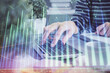 © peshkova - Double exposure of woman hands typing on computer and forex chart hologram drawing. Stock market invest concept.