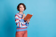 © deagreez - Photo portrait of thoughtful girl keeping pen notebook thinking about idea plan isolated on bright blue color background