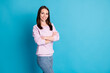 Photo of pretty lovely young lady crossed arms beaming toothy smile self-assured look camera posing successful job interview wear violet pullover denim jeans isolated blue color background
