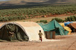 © John Wreford/Wirestock - IDLIB, SYRIA - Jun 17, 2013: Internally displaced child Syrian refugees