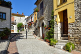 Fototapeta Na drzwi - A narrow street among the old houses of Pietrelcina, a medieval village in the Campania region, Italy.