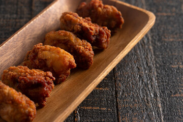 Wall Mural - Breaded and Fried Oysters on a Rustic Wooden Table