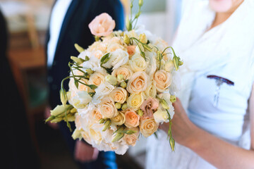 Wall Mural - woman with rose wedding bouquet at ceremony