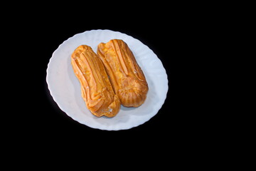 cream cake on a dark background