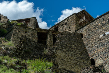 Old Fortress in mountain village Shatili, ruins of medieval castle