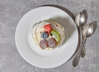 Wall Mural - Pavlova cake on white plate