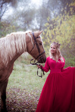Beautiful Woman In Crown, Blonde With Horse. Princess In Fairy Tale. Fantasy Autumn