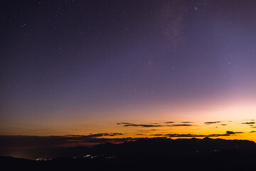 Wall Mural - amazing galaxy with the milky way and golden bright light before sunset,