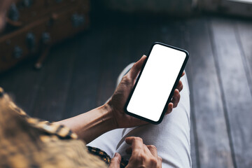 cell phone blank white screen mockup.woman hand holding texting using mobile on desk at office.background empty space for advertise.work people contact marketing business,technology