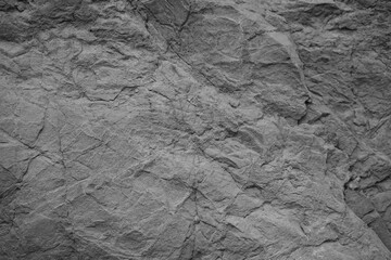 Wall Mural - White rock texture. Gray stone background. Grunge background. Rough rocky surface with cracks.