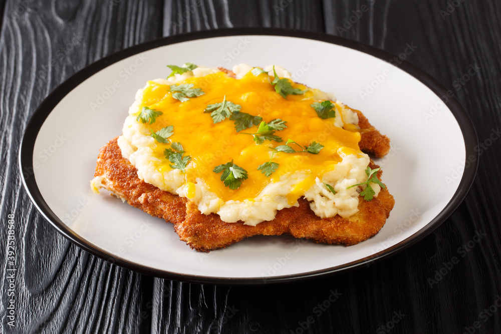 Breaded Chicken Parmo Baked With Bechamel Sauce And Cheddar Cheese breaded-chicken-parmo-baked-with-bechamel-sauce-and-cheddar-cheese