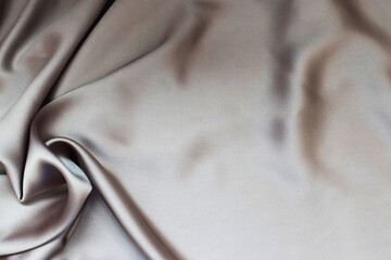 Background texture of silk fabric with pleats