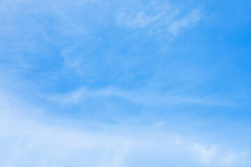 Wall Mural - blue sky background and white clouds soft focus, and copy space