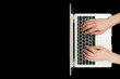 © Object Studio - Top view of businessman hands busy using laptop at black office desk.
