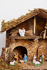 Christmas hygge interior with christmas nativity scene with holy family