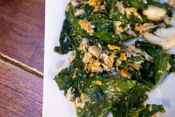 Stir-fried Malindjo leaves with egg