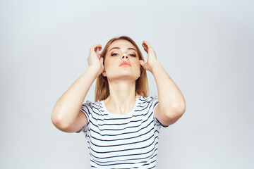 Poster - cute blonde girl in striped t shirt lifestyle studio