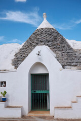 Wall Mural - Ceglie, Italy - September 03, 2020: View of a trullo, apulian old house